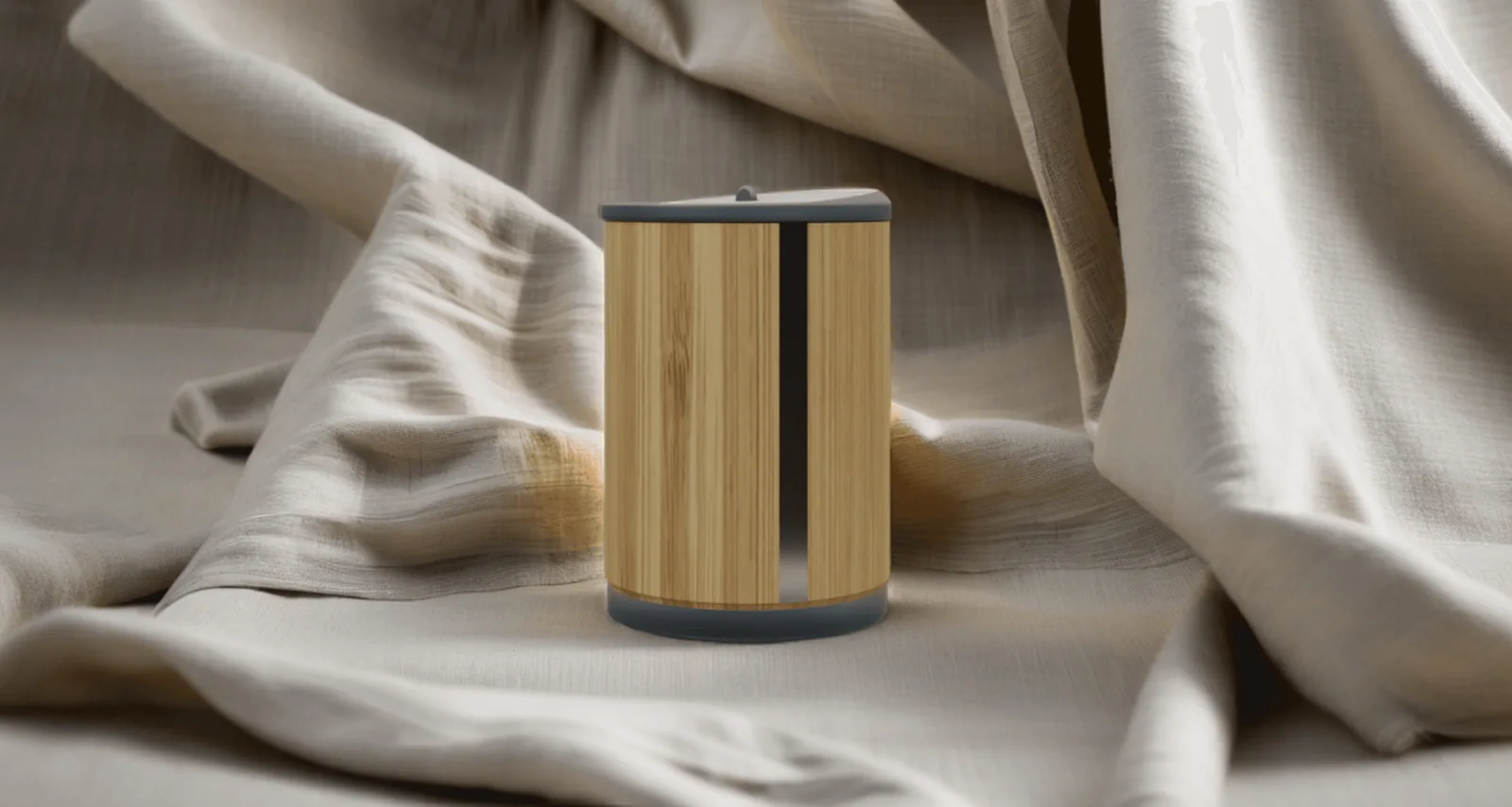 Bamboo tumbler on folded cloth, studio lit